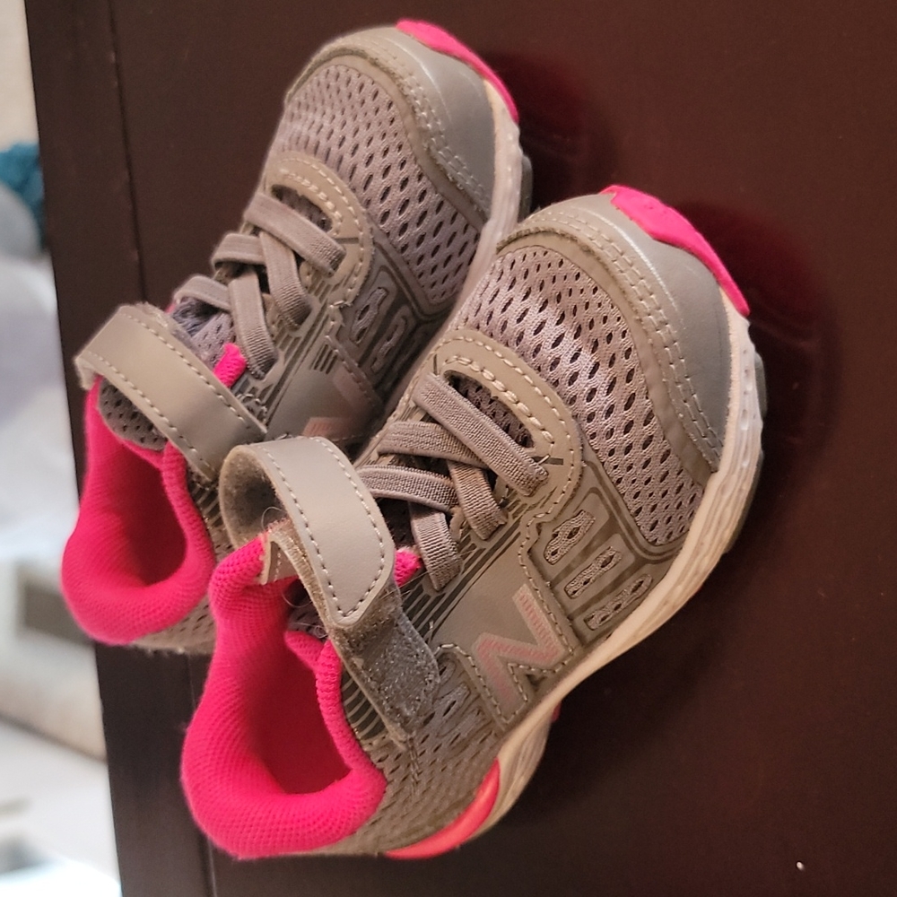 Unworn New Balance girls sneakers